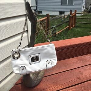 Super stylish white Staccato club purse